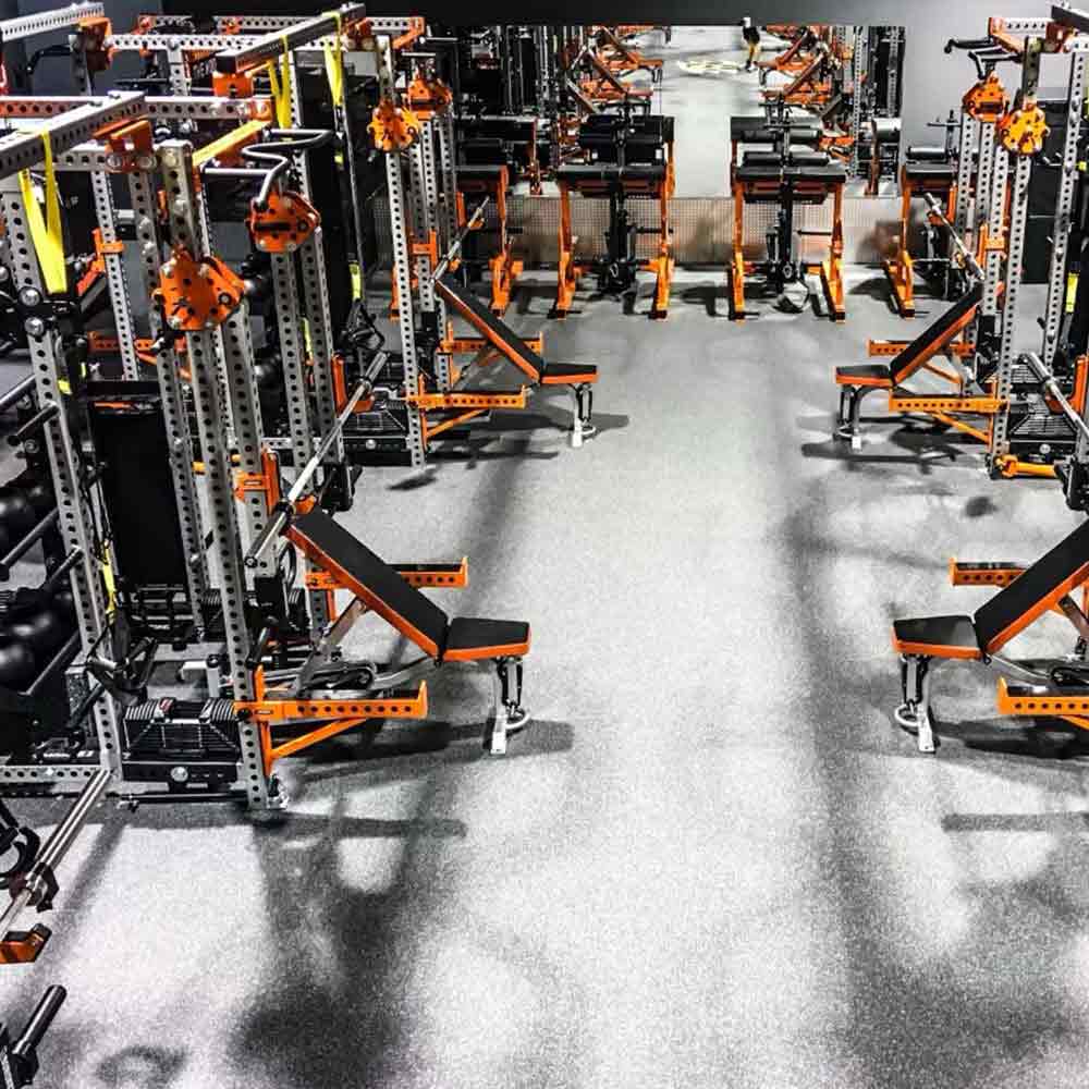 Functional and Hyrox performance zone with commercial multi gym machine and Weightlifting platform